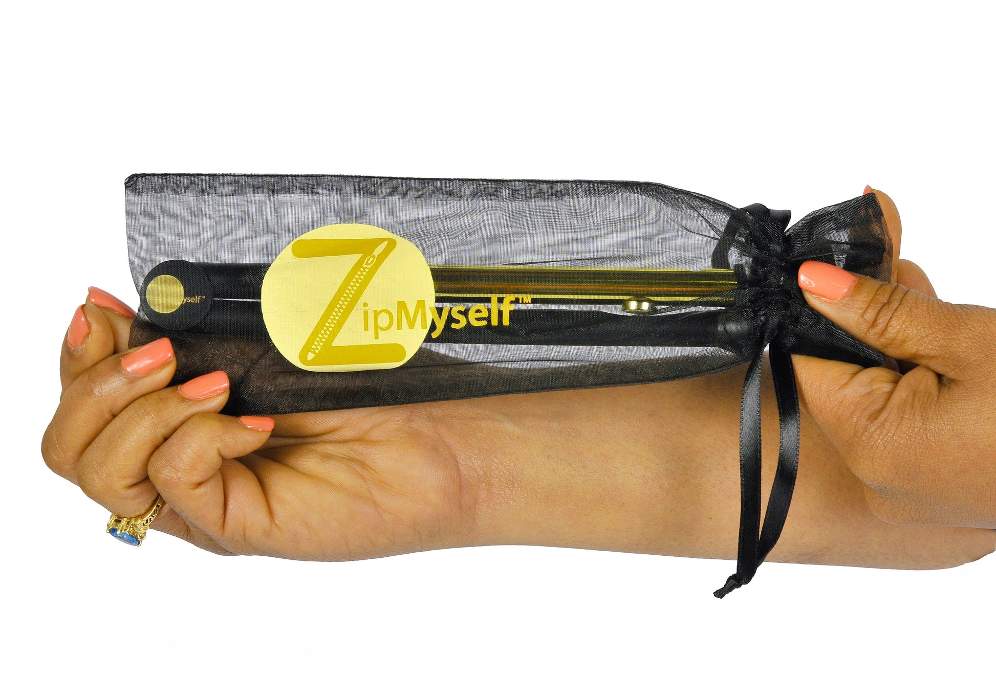 ZipMyself in mesh bag → ZipMyself compact dressing tool stored in mesh carrying bag